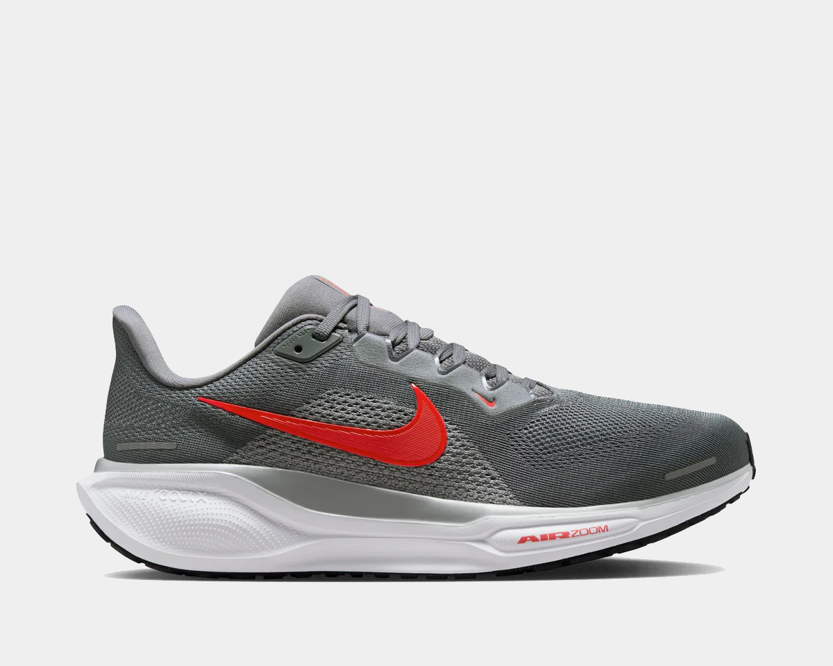 Gray running shoe with a red Nike logo on a white background