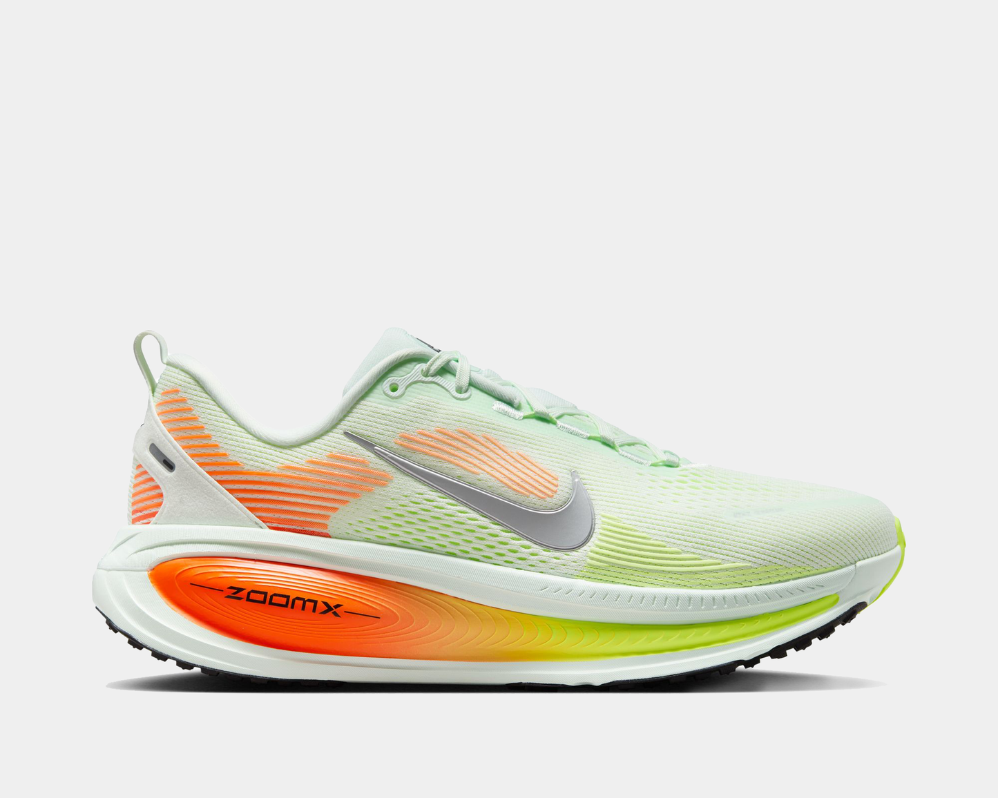 Neon green and orange running shoe with Nike logo on a white background