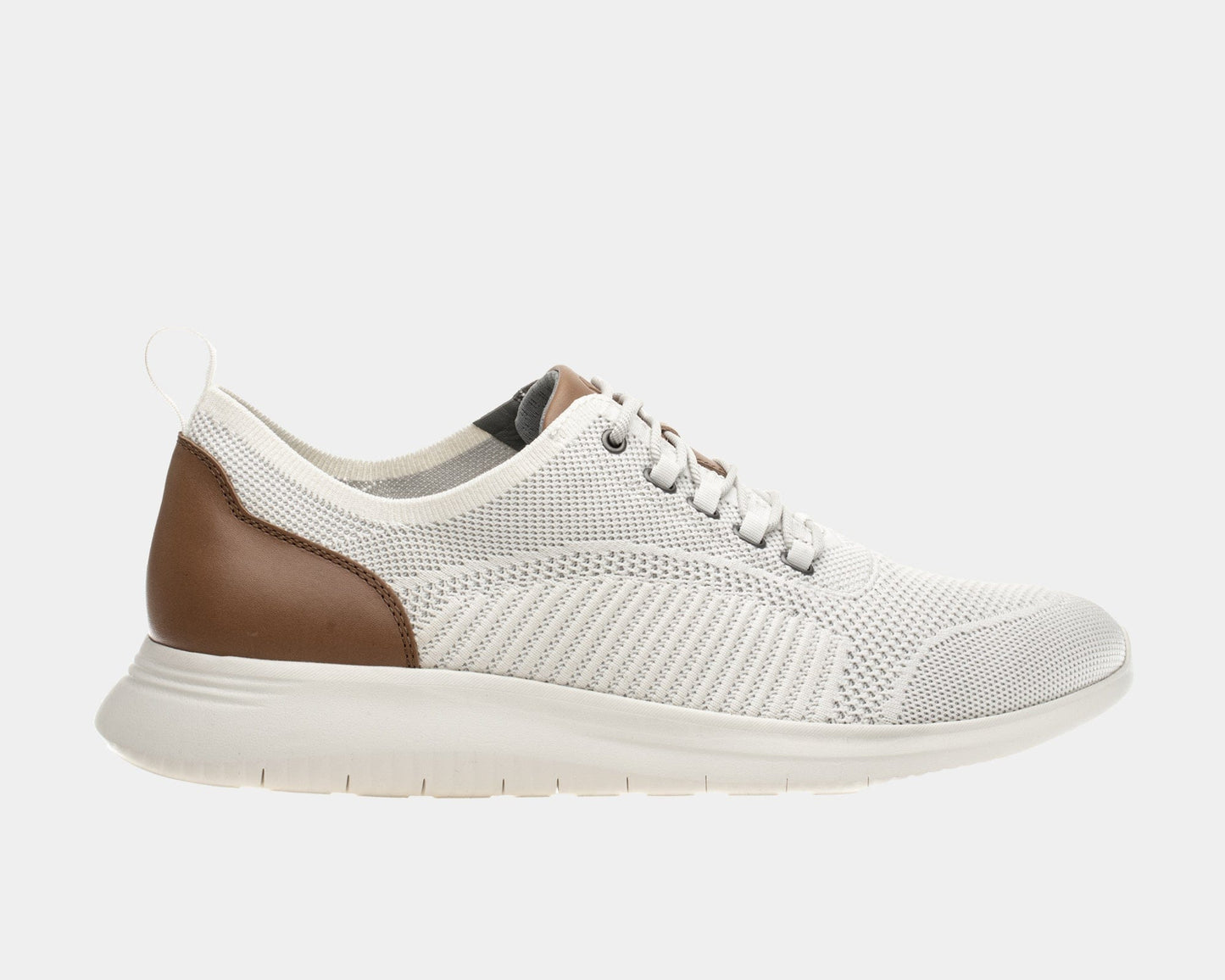 A white dress casual style knit shoe with a leather trim and a low heel design on a flat sole.