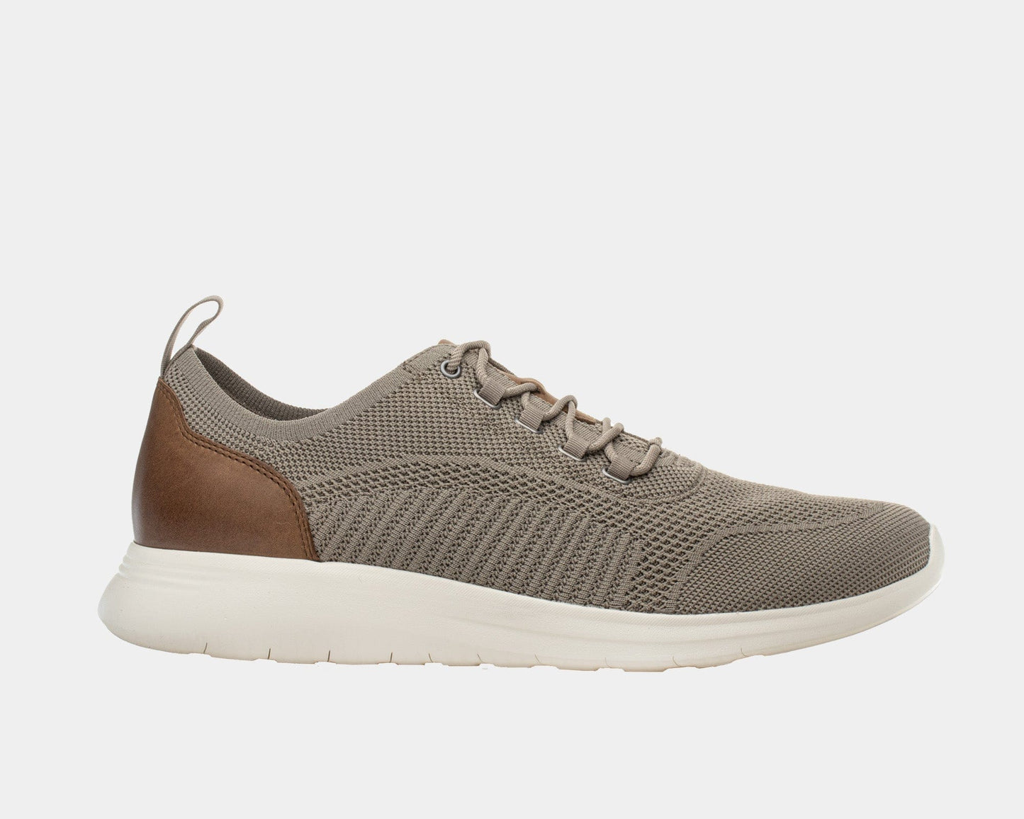A taupe dress casual style knit shoe with a leather trim and a low heel design on a flat sole.