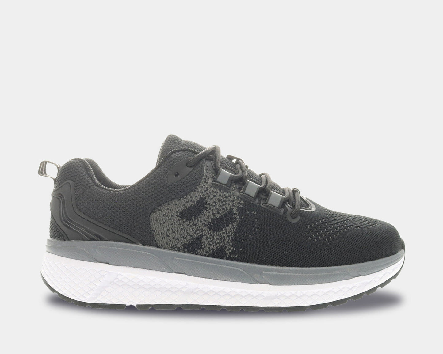 An athletic shoe featuring a two-tone mesh upper in black and grey, with a white midsole and black rubber tread.