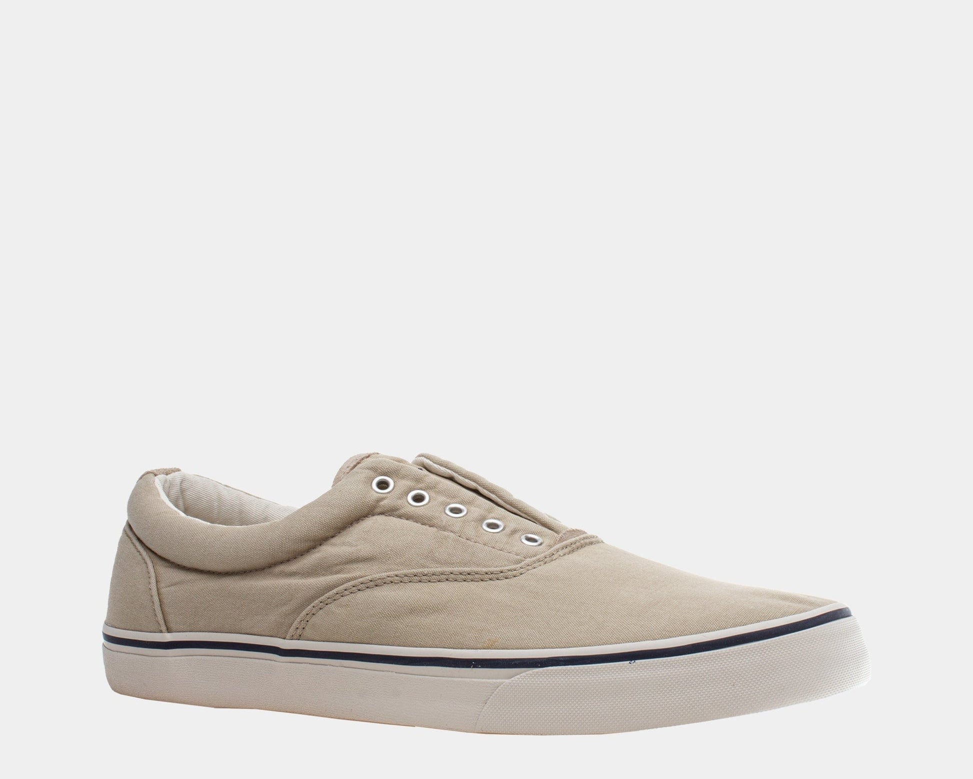 A beige sneaker with a round toe, low-top design, and lace-up closure.
