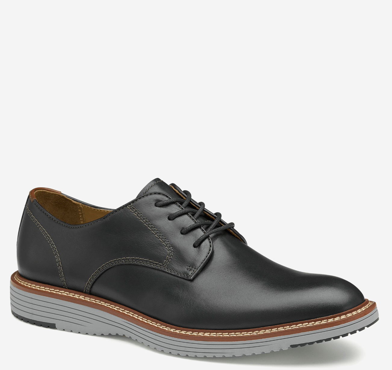 A black, plain-toe Oxford shoe with a leather upper and a rubber sole.