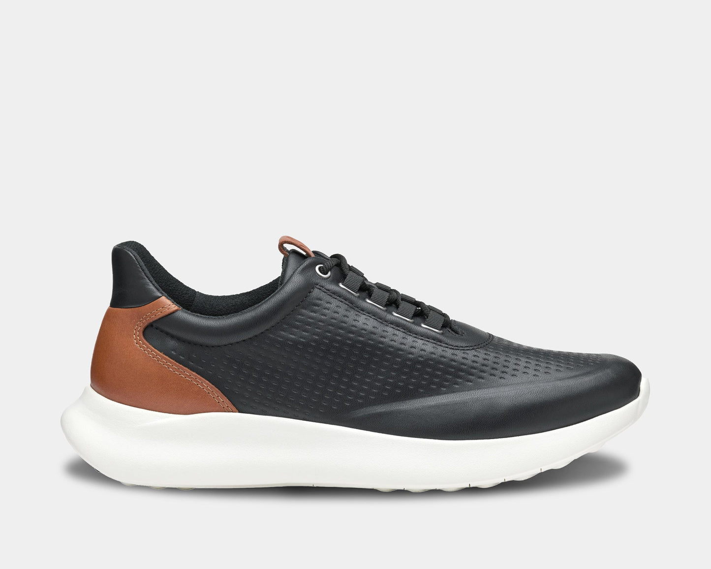 A pair of dress casual sneakers featuring a leather upper with embossed texture, a white sole, and a mix of black and brown colors.