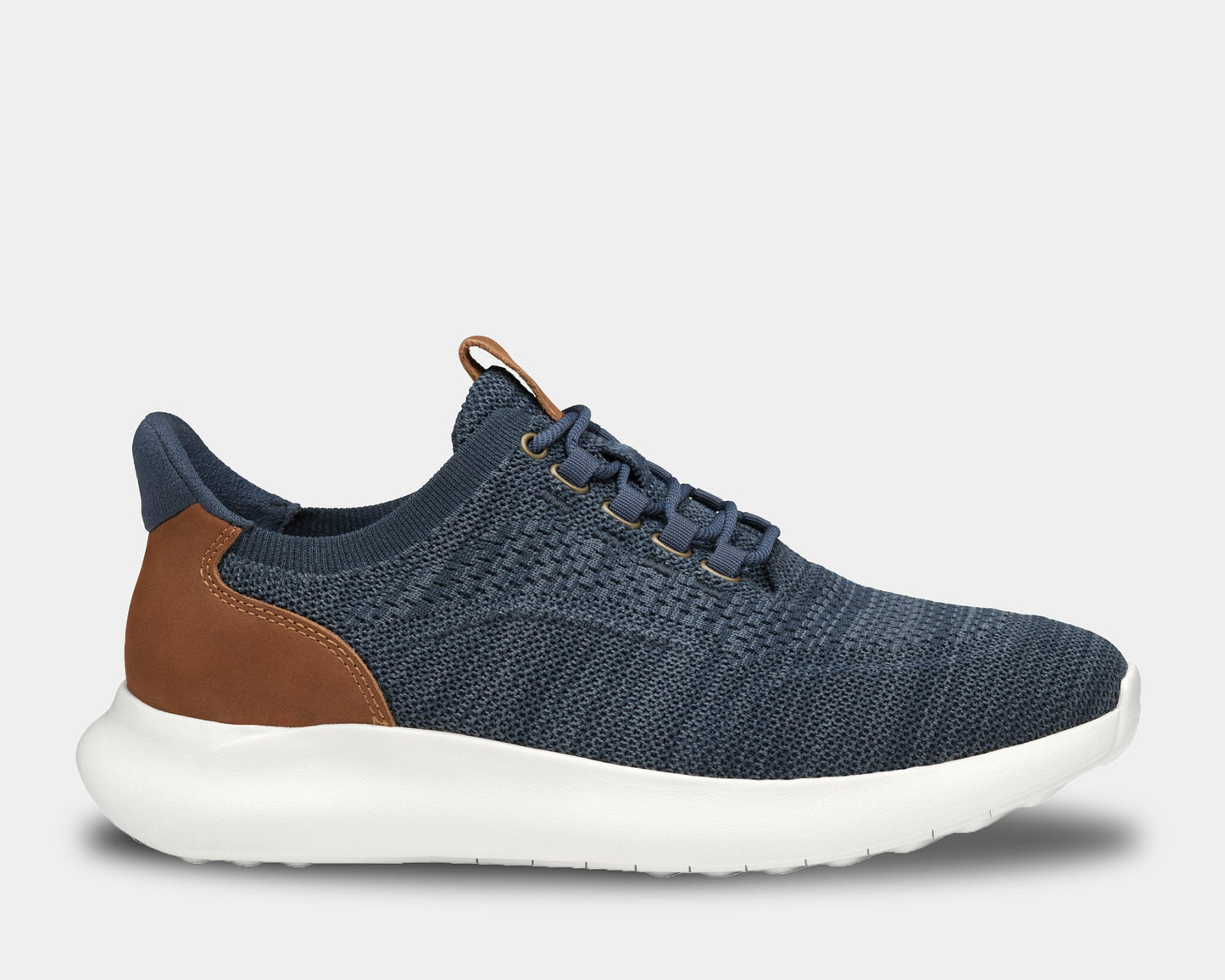 A pair of low-top athletic style knit sneakers with a plain toe design, featuring a navy heathered knit fabric, brown leather trim, and a tan heel counter.