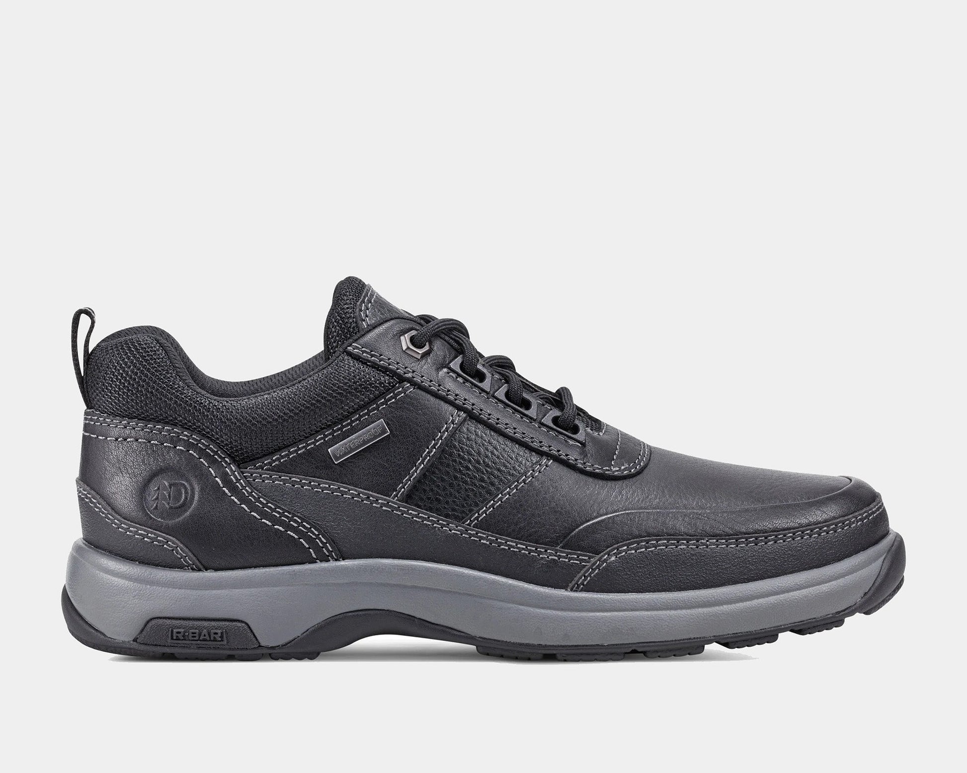 A low lace-up style men's boot with a waterproof design, featuring a padded tongue and collar, and a slip resistant outsole. The boot is primarily dark brown with some black detailing and a grey sole.