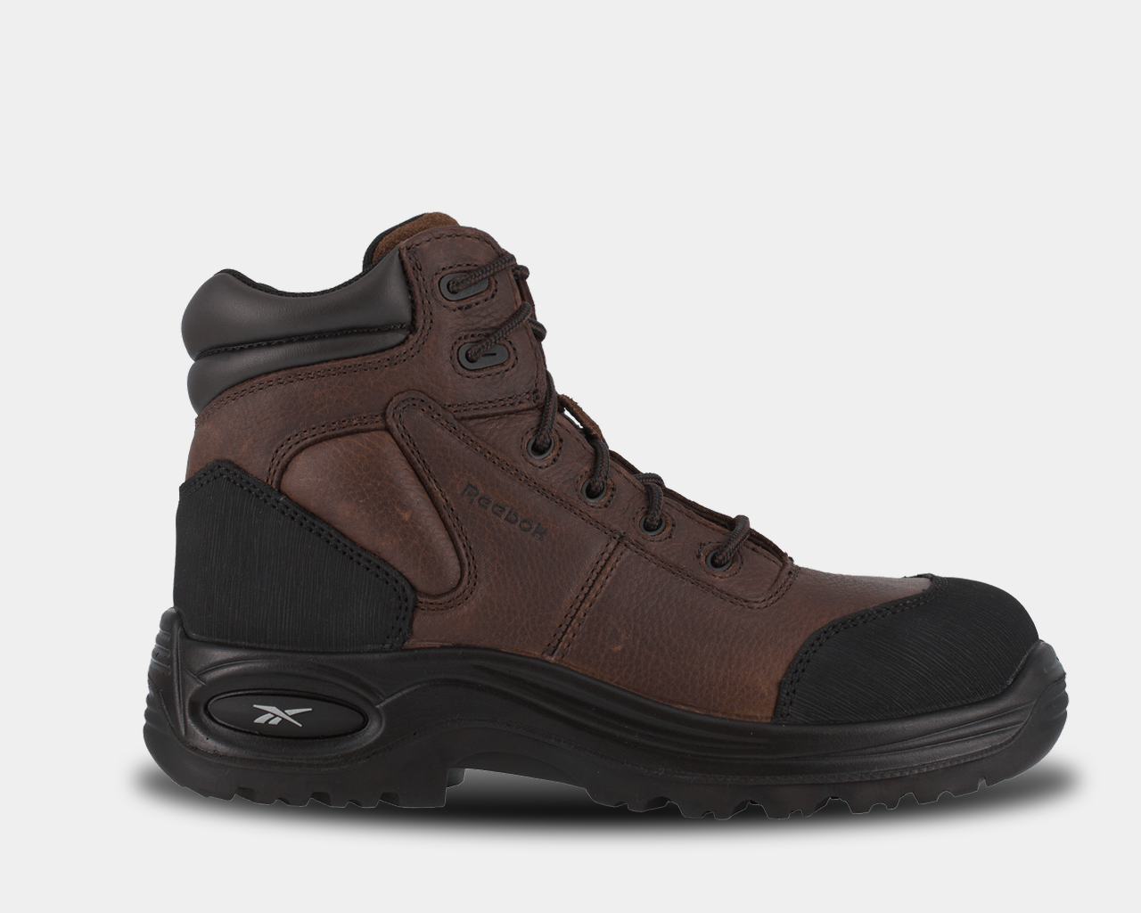 A brown 6 inch sport composite toe work boot with a black rubber outsole, designed for safety and comfort.