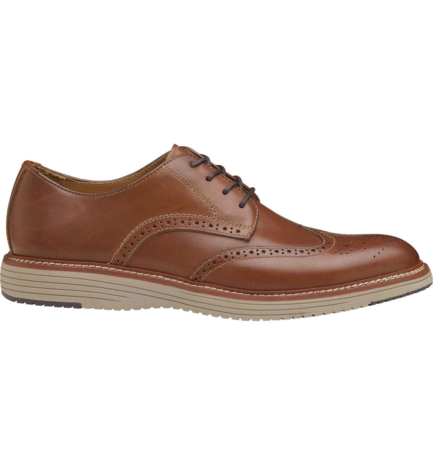 A brown cushioned wingtip oxford shoe with a leather upper and a rubber outsole.