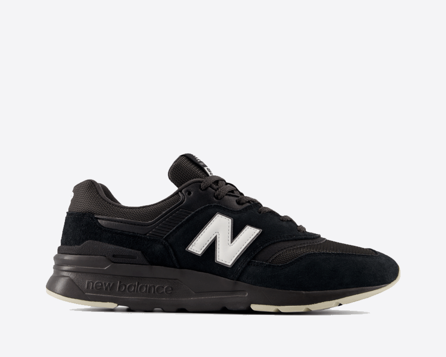 Black New Balance sneaker on a white background