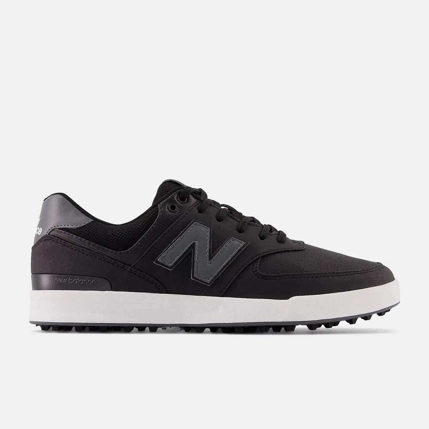 A pair of golf shoes with a waterproof microfiber leather and performance mesh upper, featuring a black color scheme and grey logo.