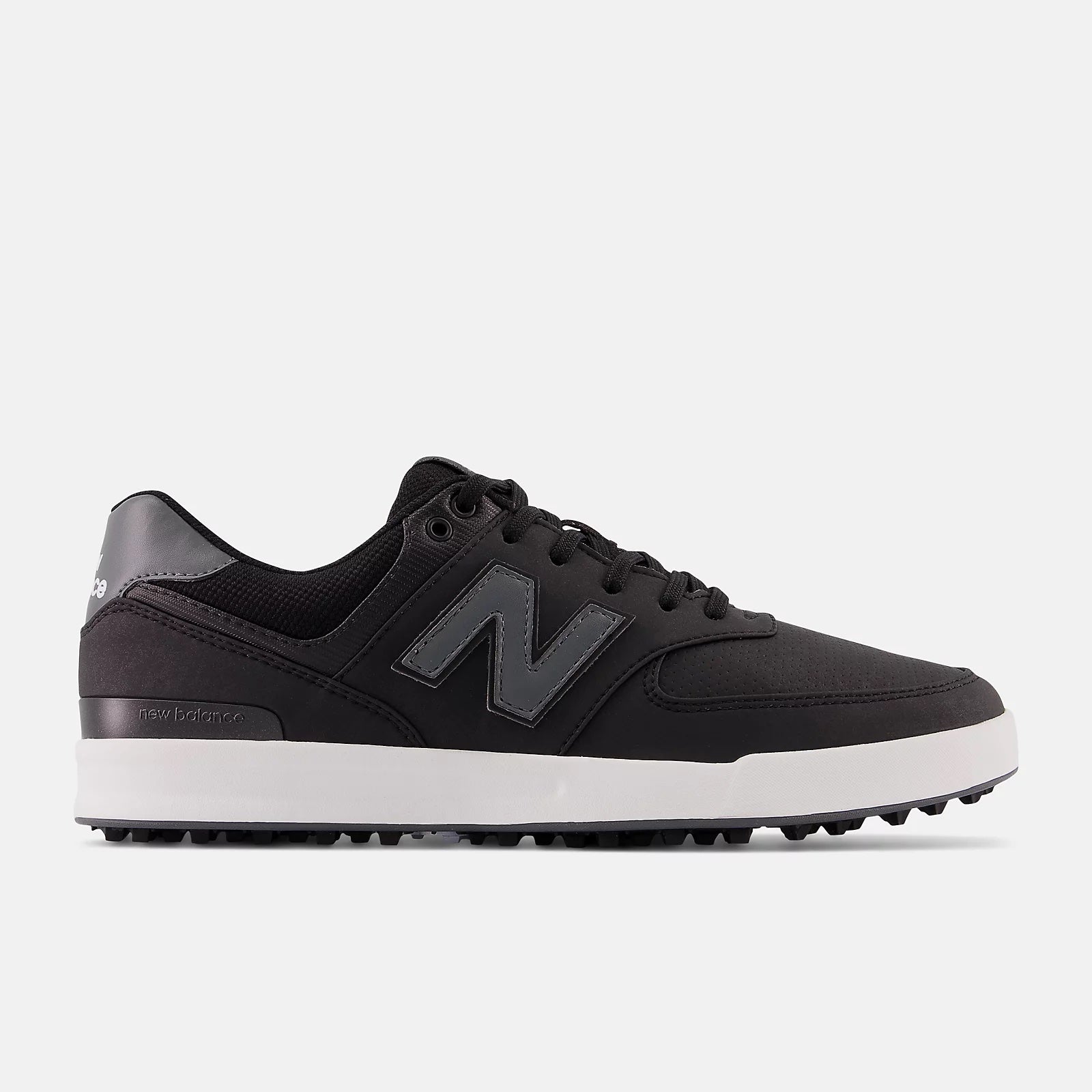 A pair of golf shoes with a waterproof microfiber leather and performance mesh upper, featuring a black color scheme and grey logo.